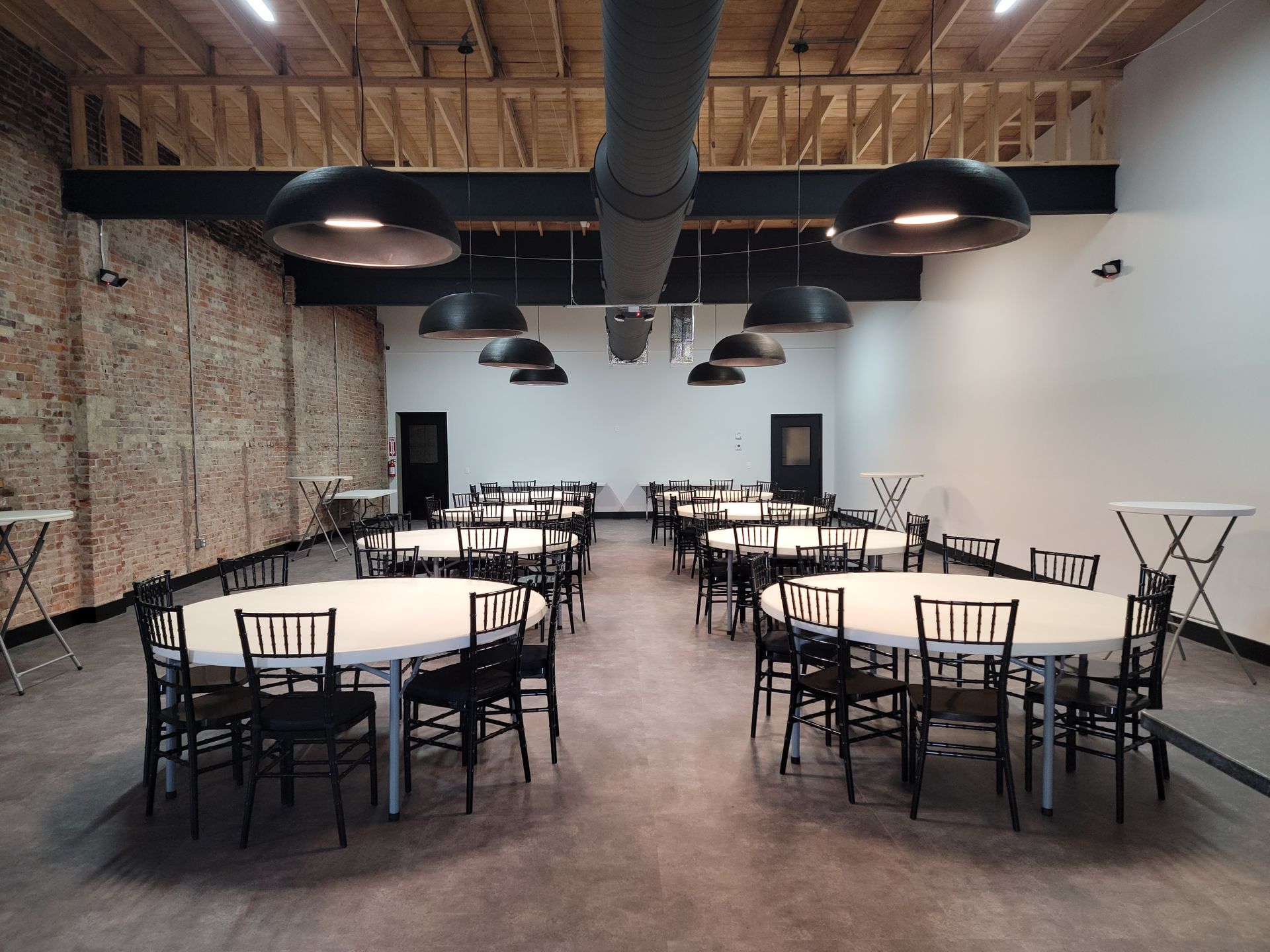 Table and chairs setup at The Rochester