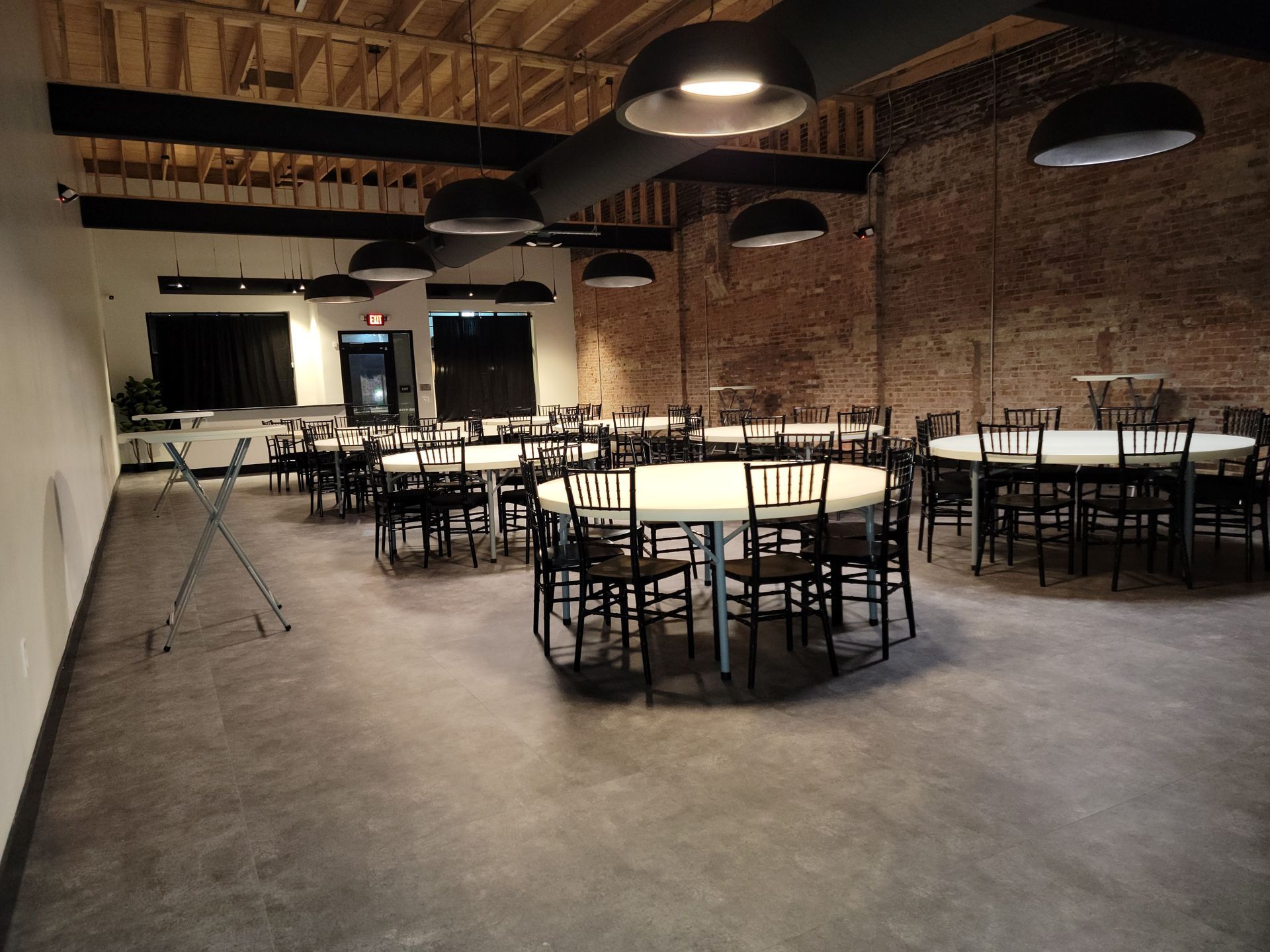 Table and chairs setup at The Rochester