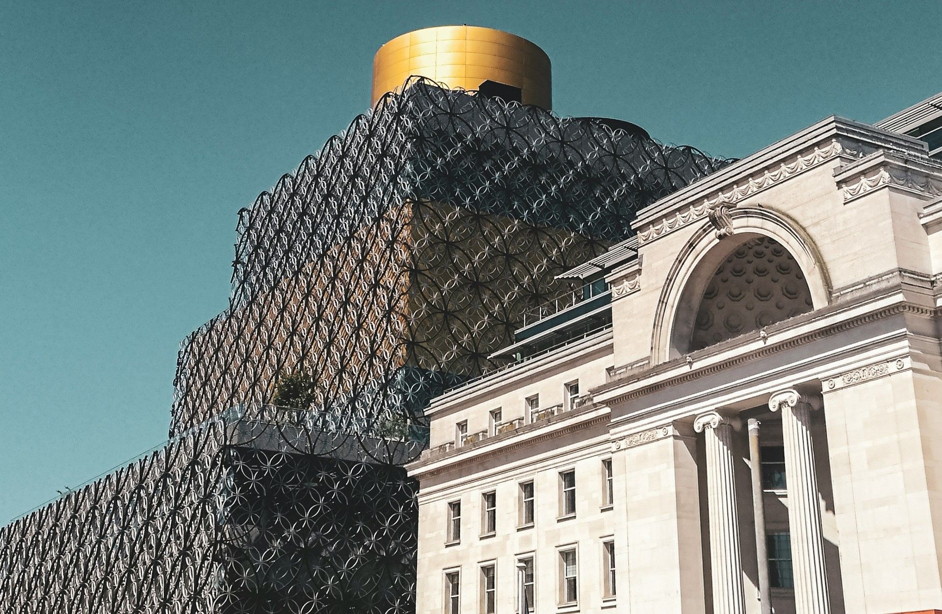 A view of The Library of Birmingham and Baskerville House in Centenary Square, Birmingham