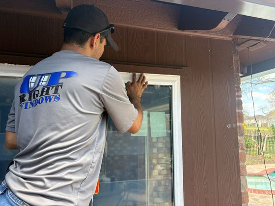 A person wearing a grey shirt with