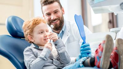 Boy With Dentist at the Dental Office Boy With Dentist at the Dental Office