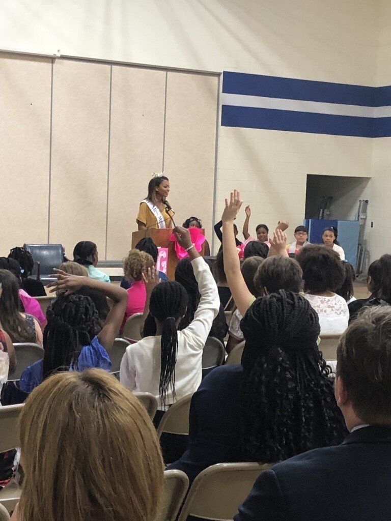 Miss USA Answering Questions In A Conference