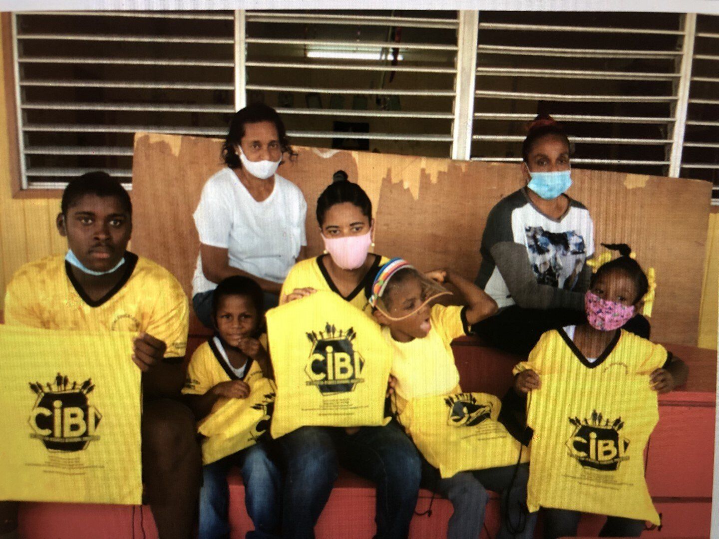 Special Education Center Students Holding Schools Supplies They Received