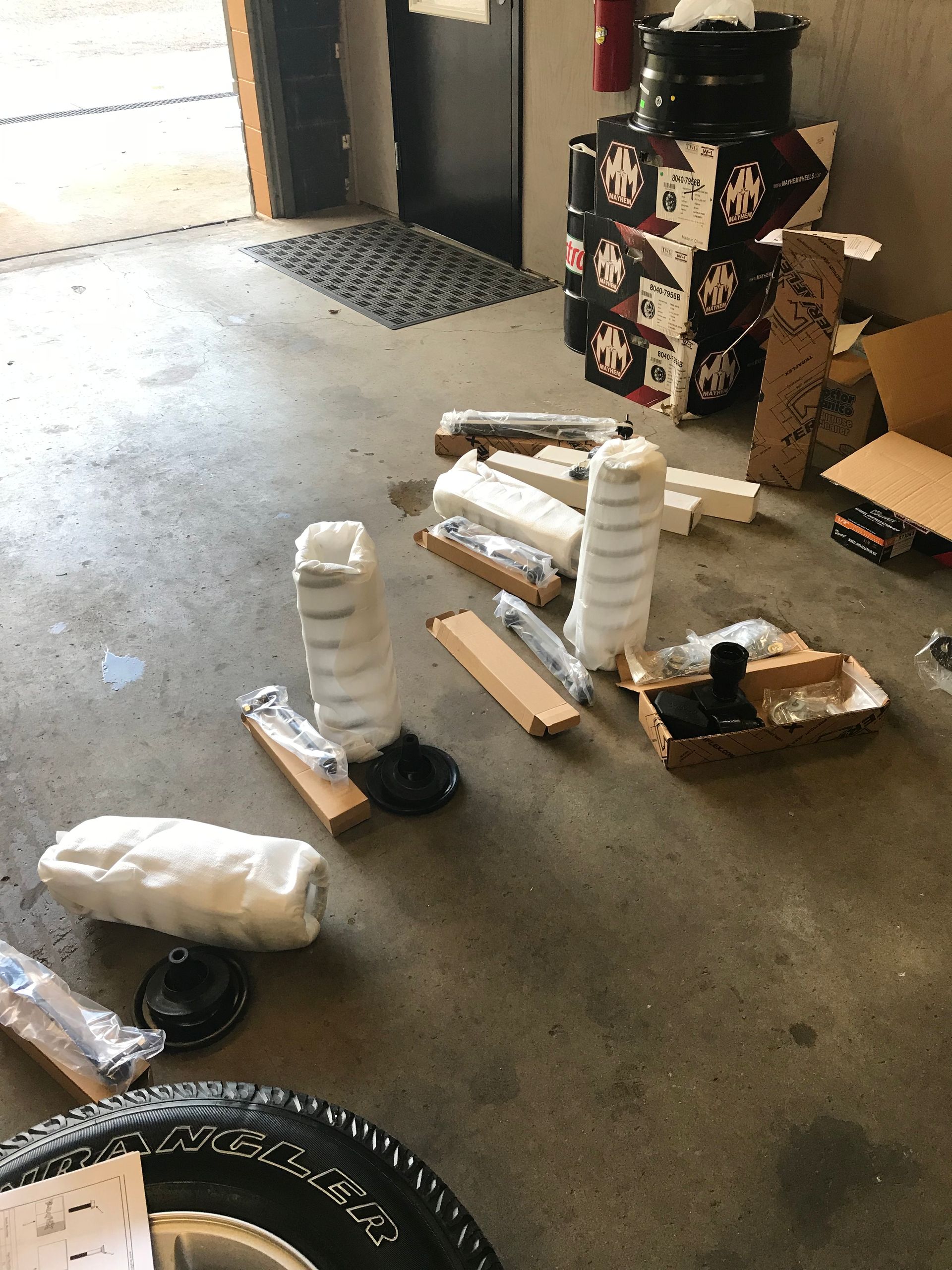 Vehicle Parts on Ground - Mr. Best Wrench