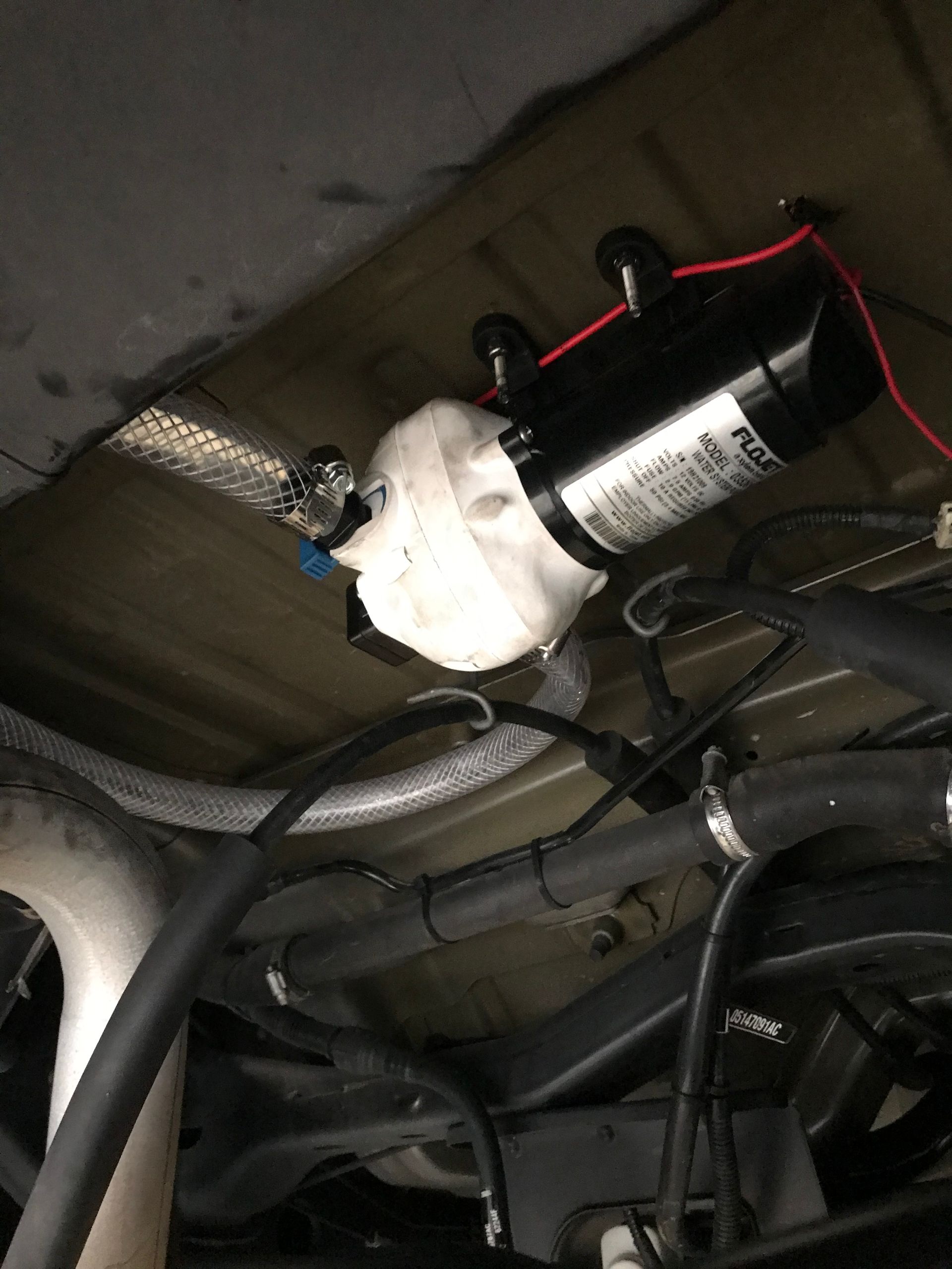 A Water Pump is Attached to the Ceiling of a Vehicle - Mr. Best Wrench