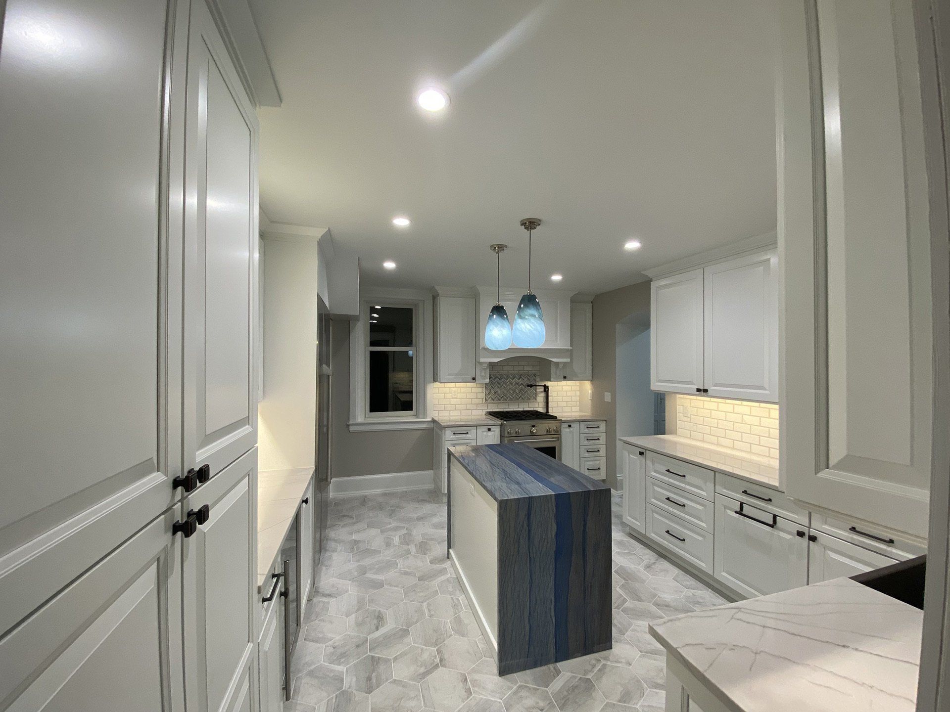 Gray Painted Kitchen Cabinets Remodel — Lakewood, CO — Altitude Contractors