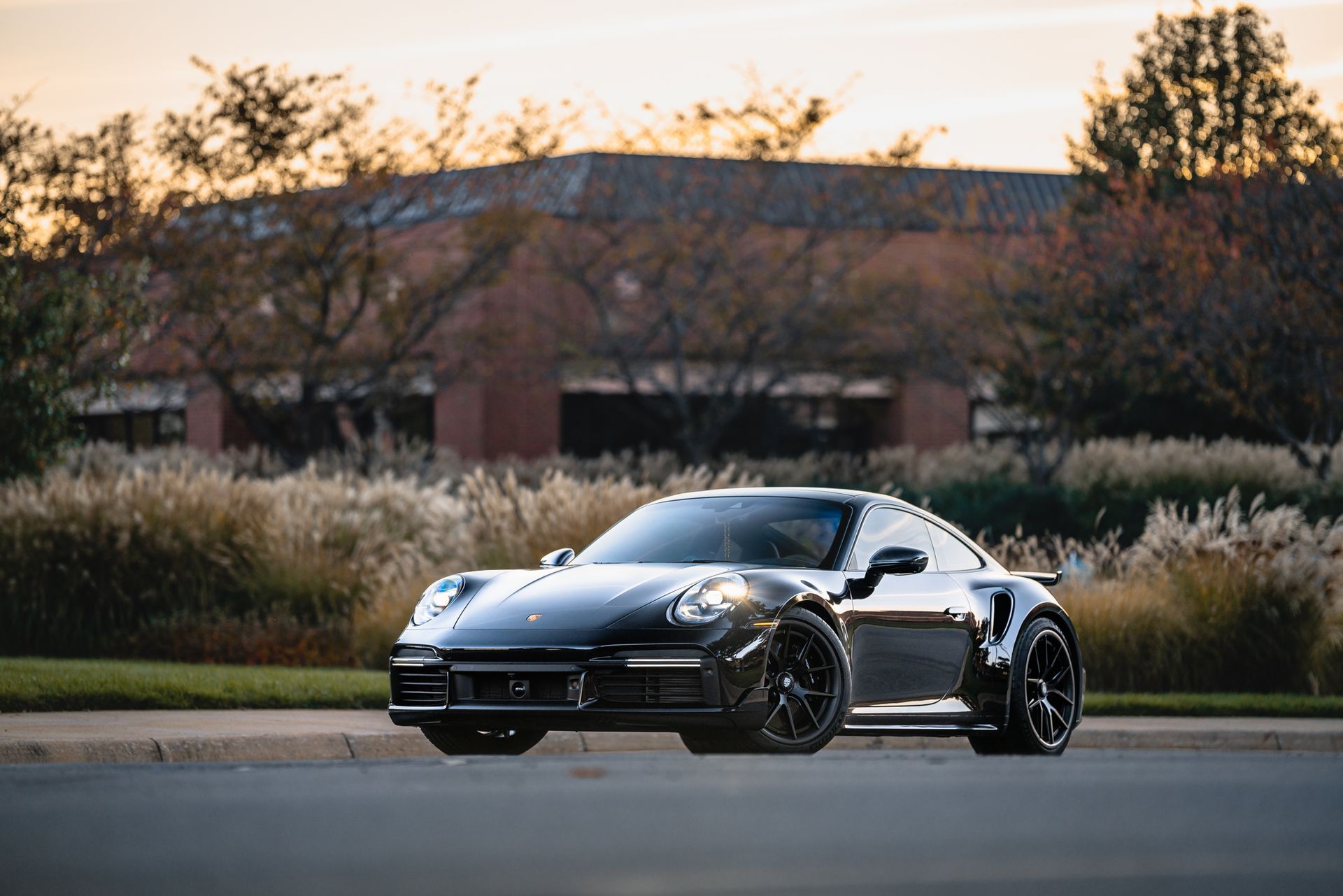 Black Porsche 911 Turbo with ceramic coating, showcasing a glossy finish