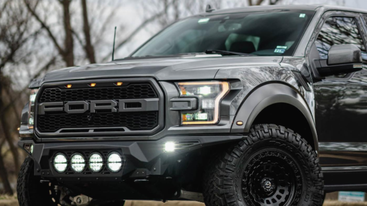 black car with ppf parked on the road