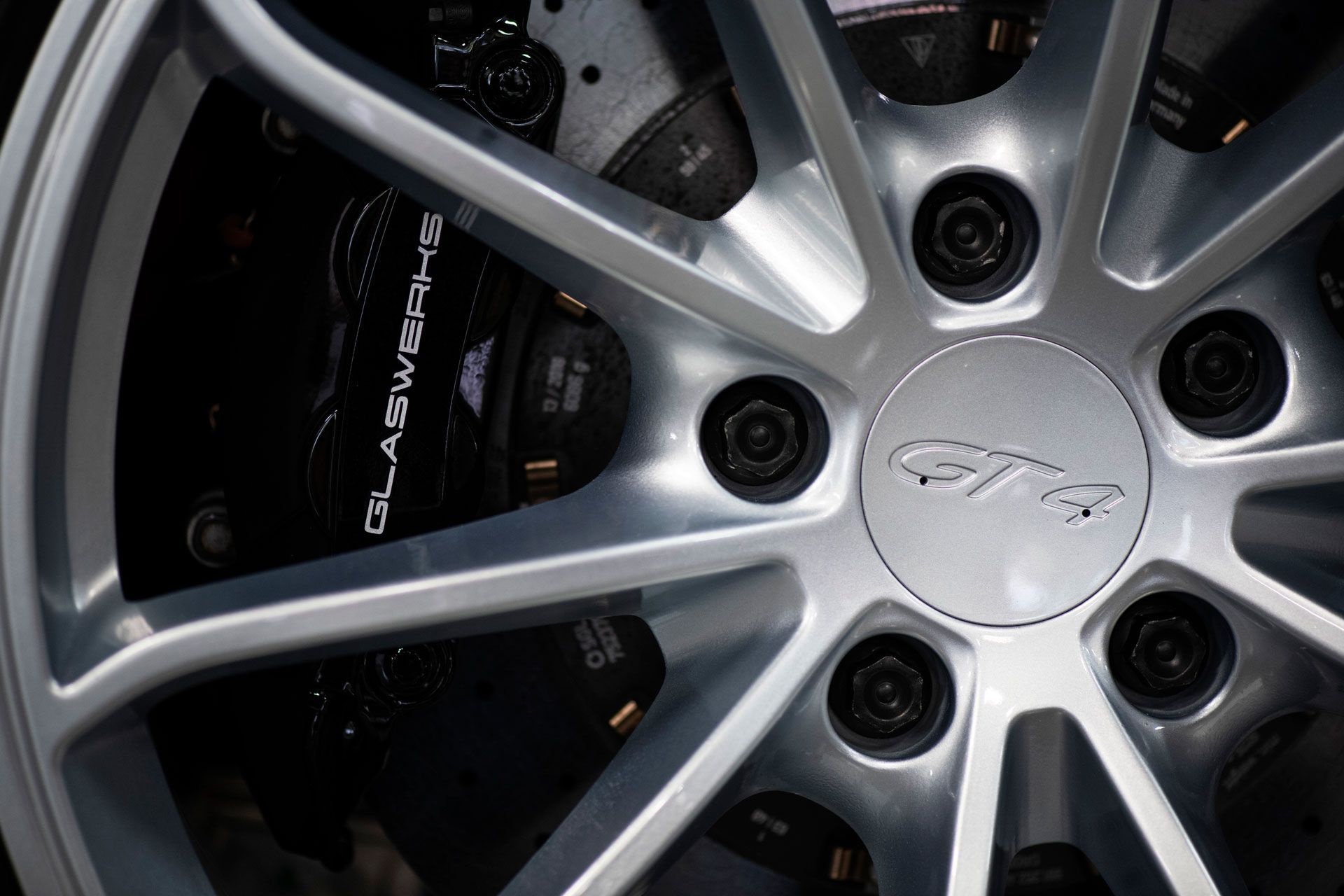 A close up of a car wheel with the word gtr on it