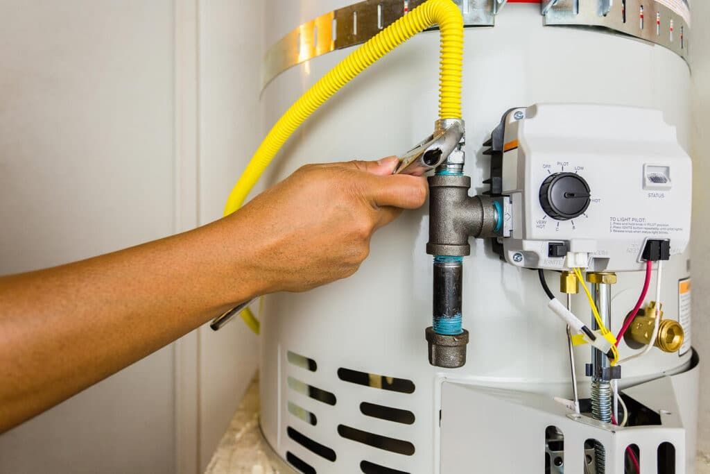 Tech safely installing Gas line on water heater in Phoenix AZ