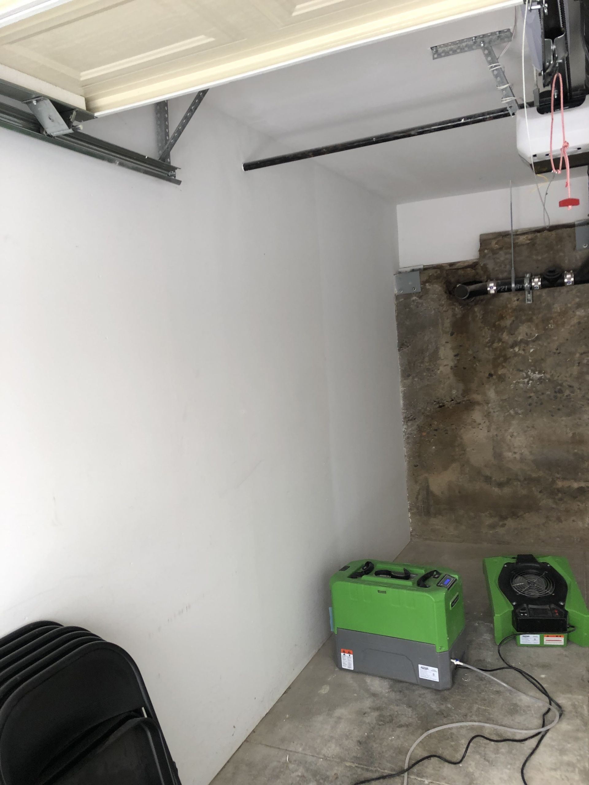 There is a green box in the middle of the room.