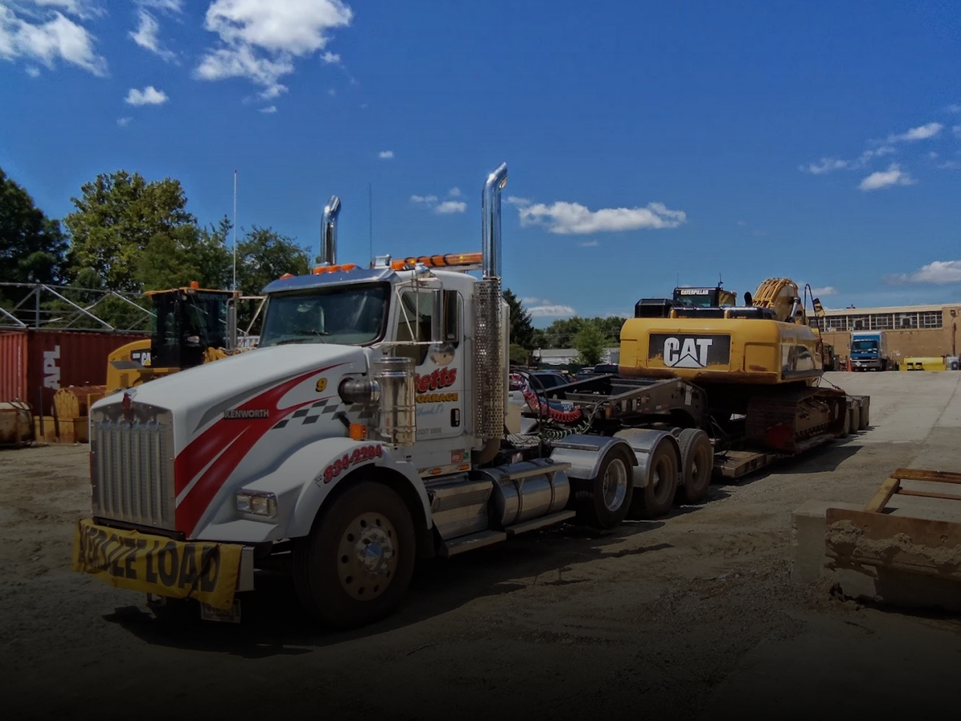 Betts Garage heavy-duty hauling truck transporting construction equipment