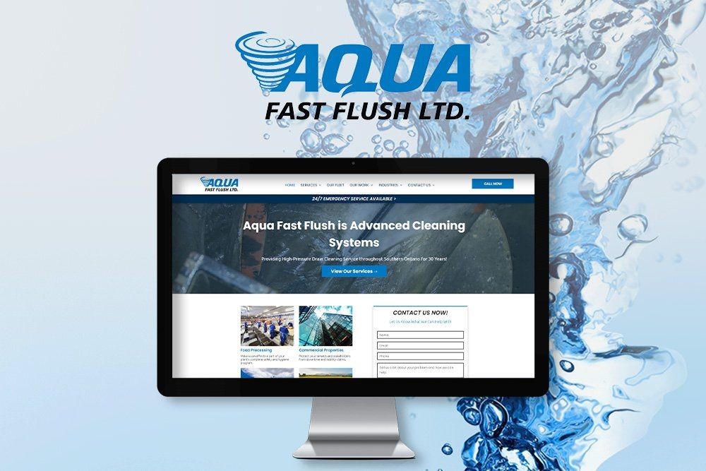 A computer monitor displaying a website for aqua fast flush ltd.