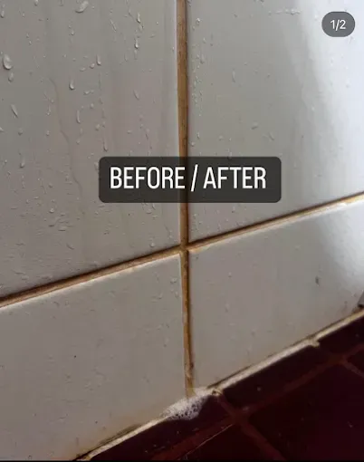 Close-up view of bathroom tiles, showing stained grout before cleaning and then much cleaner grout after cleaning.