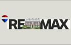 RE/MAX logo with a house silhouette replacing the "O"