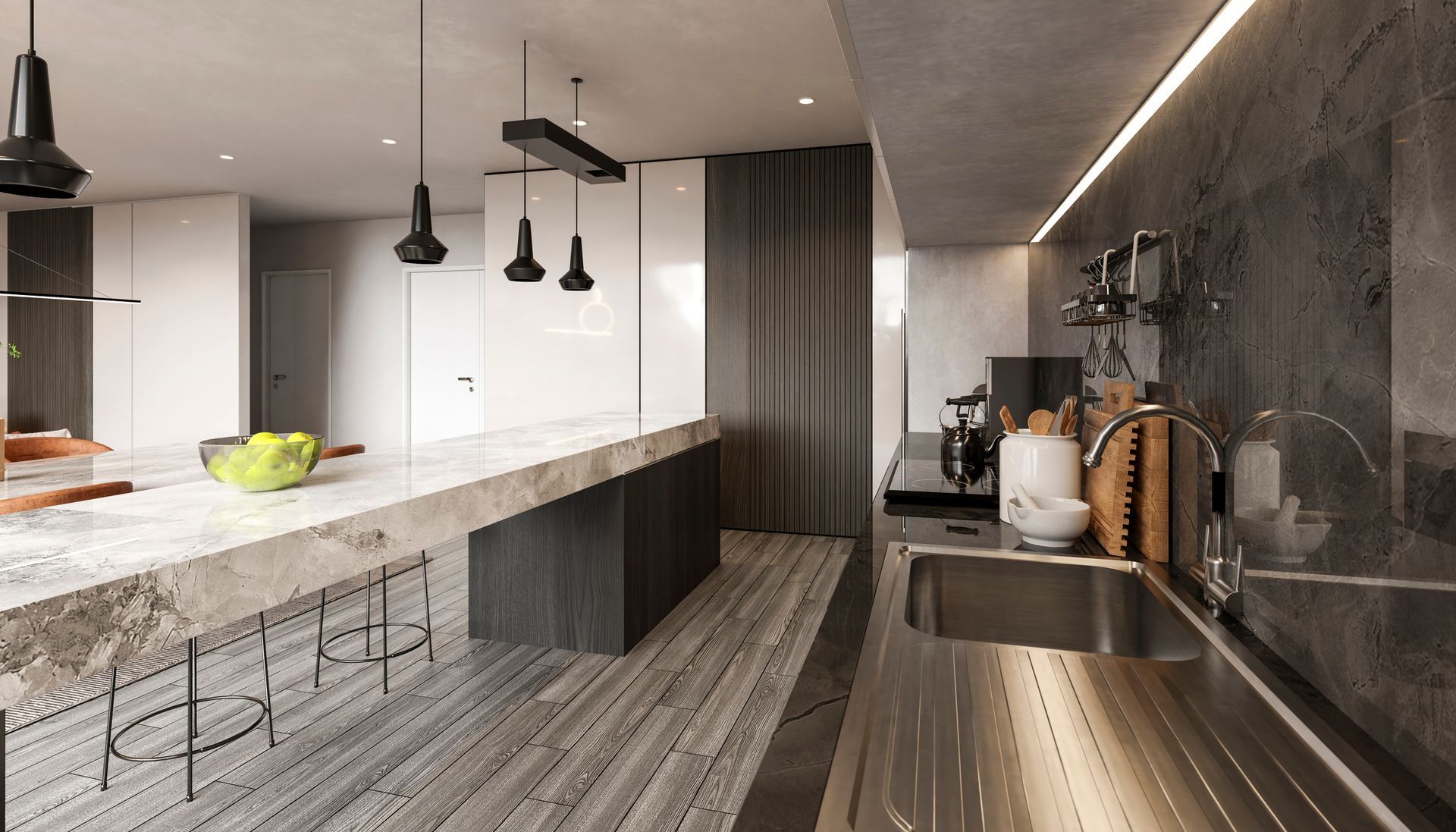 Modern kitchen with marble countertop island, stainless steel sink, and dark pendant lights.