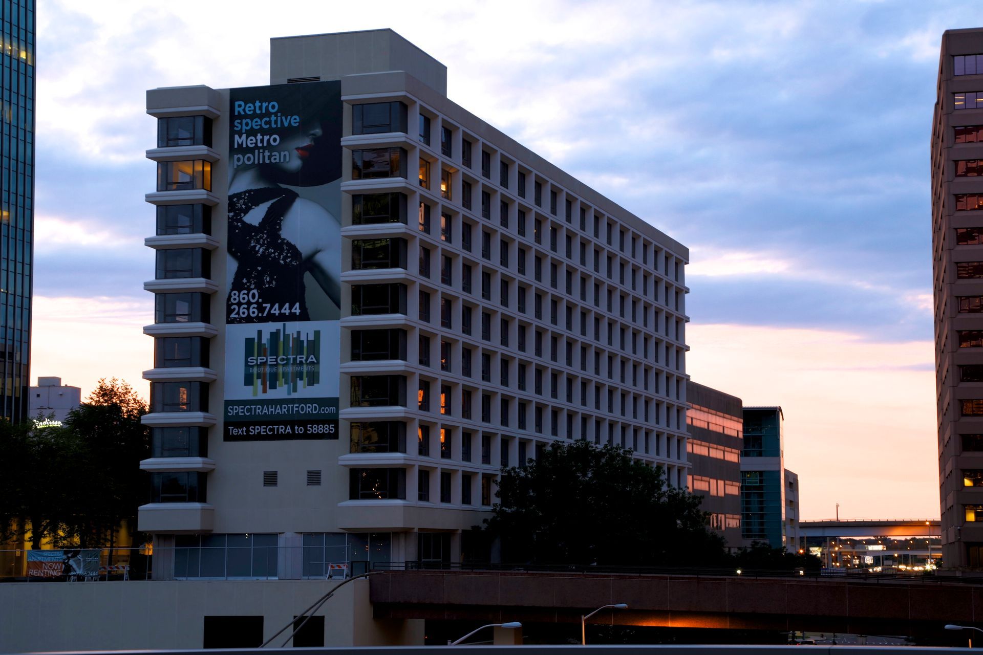 A large building with a large billboard on the side