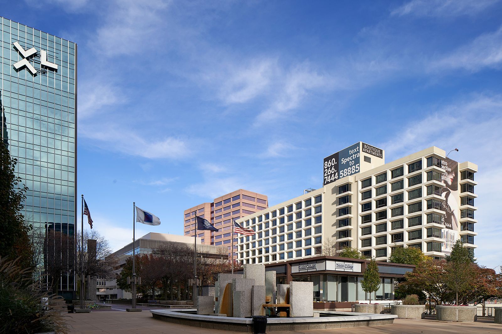 A large building with the letter x on the top of it