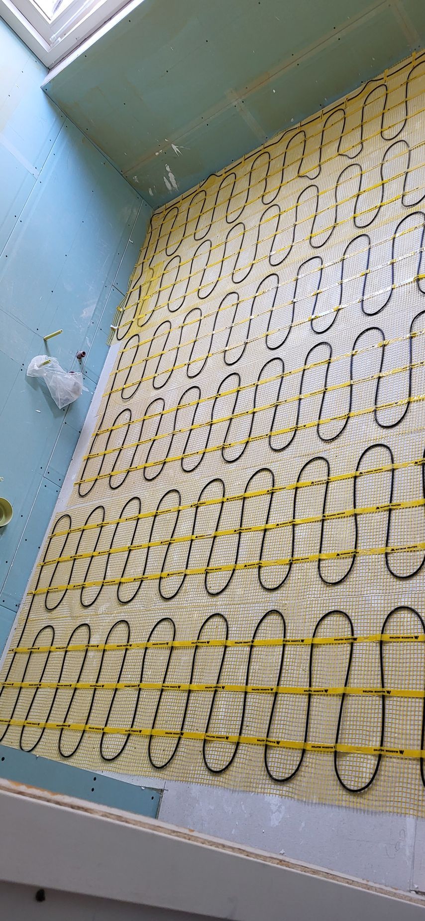 elektrische vloerverwarming badkamer