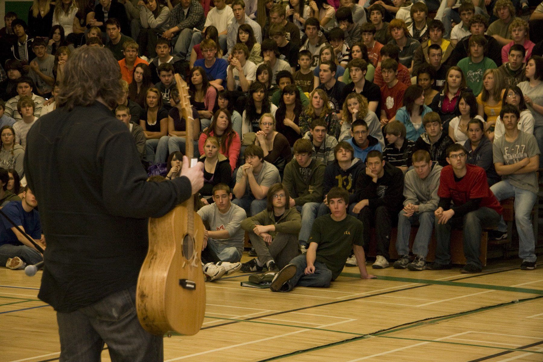 Jowi with Voyageur addresses an assembly of high school students in Sudbury ON.
