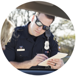 police officer giving a traffic ticket