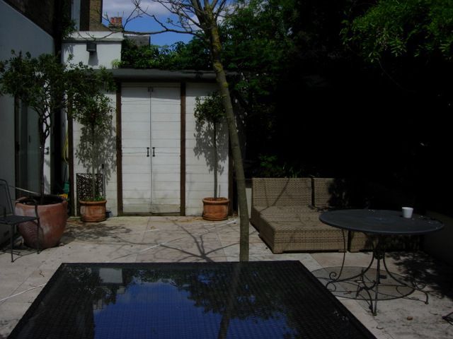 Garden before landscaping lacks colour 