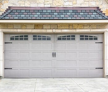 Car garage with windows and grey panels — Residential Garage Doors in Fredericksburg, VA