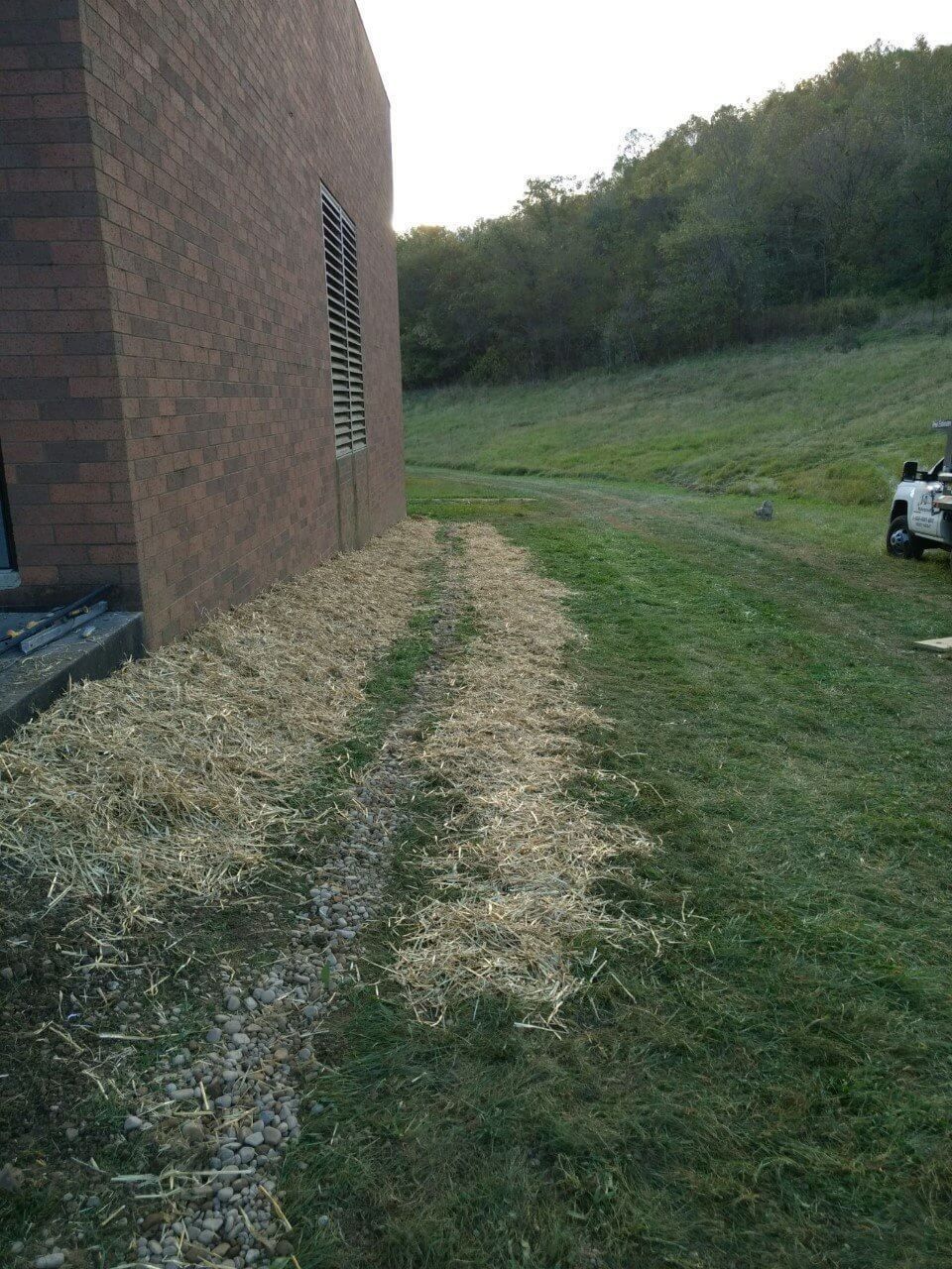 Dried Straw Beside Building Wall — Canonsburg, PA — J&D Waterproofing & Home Improvements Inc.
