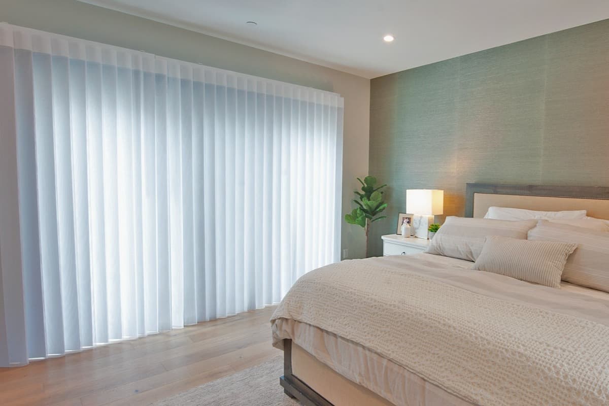 Norman® SmartDrape™ Shades on sliding glass doors in bedrooms near San Diego, California (CA)