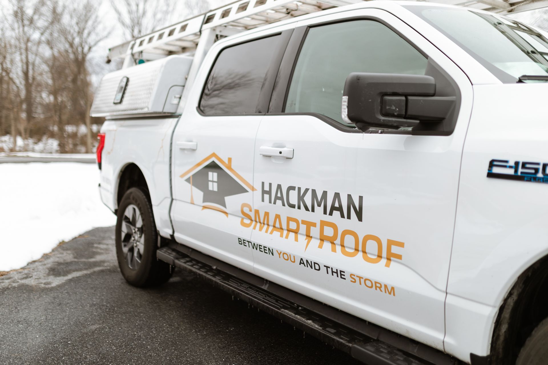 A white pickup truck with the 