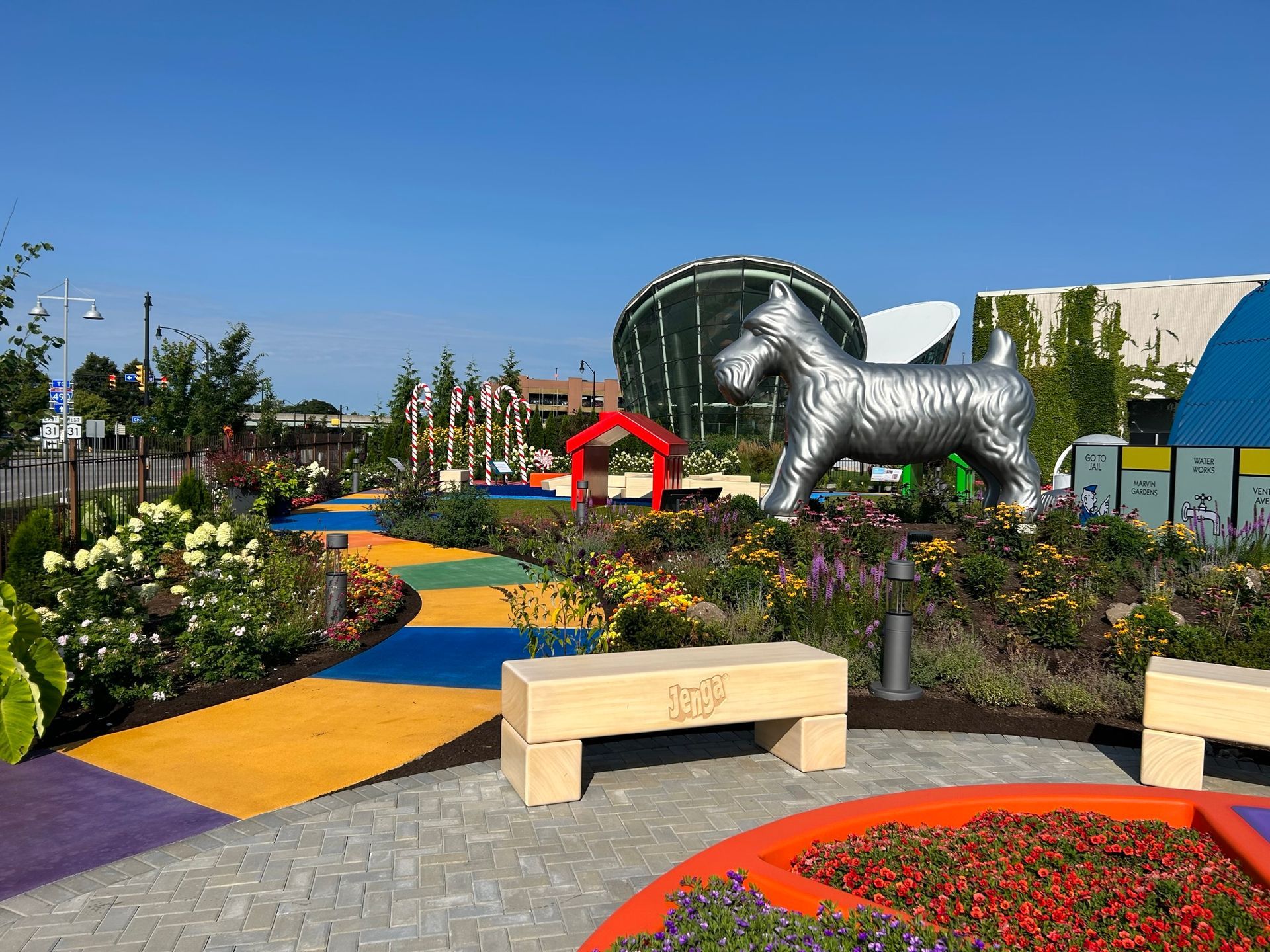 There is a statue of a horse in the middle of a park.