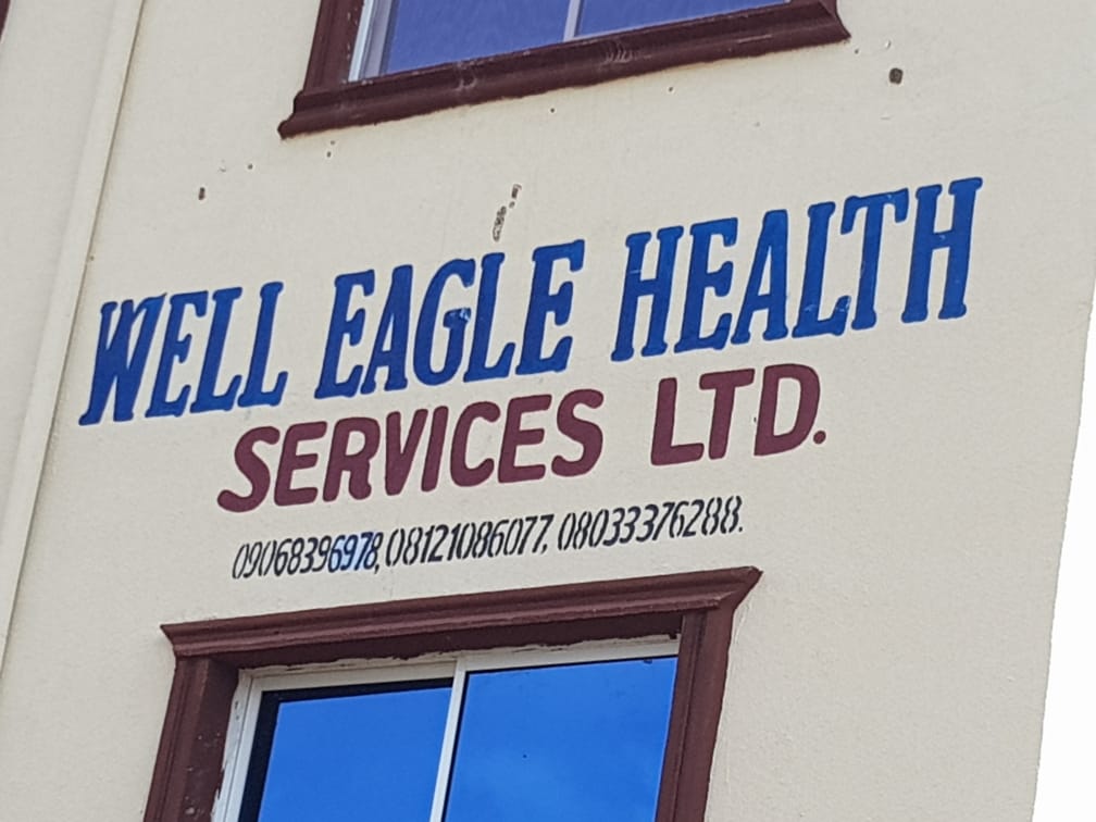 A building with a sign that says well eagle health services ltd