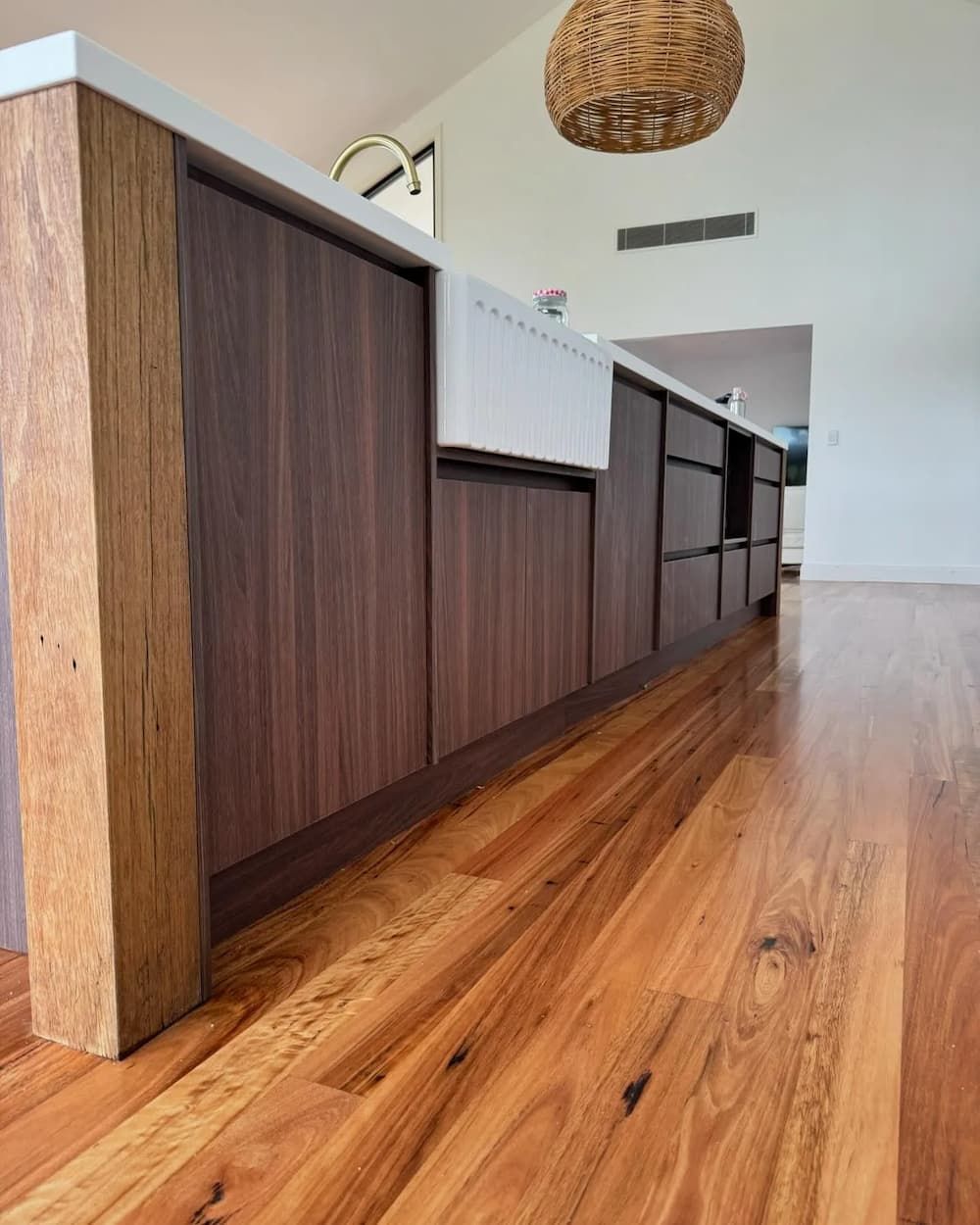 A Kitchen With Wooden Cabinets And A Wooden Floor — D & L Custom Cabinets  In South Murwillumbah, NSW 