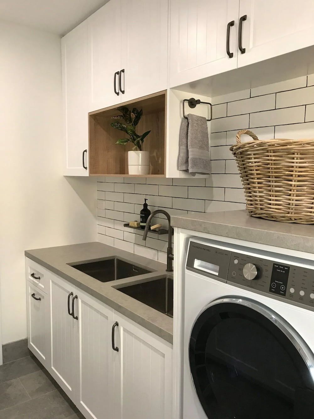 A Laundry Room With A Sink , Washer And Dryer — D & L Custom Cabinets  In South Murwillumbah, NSW 