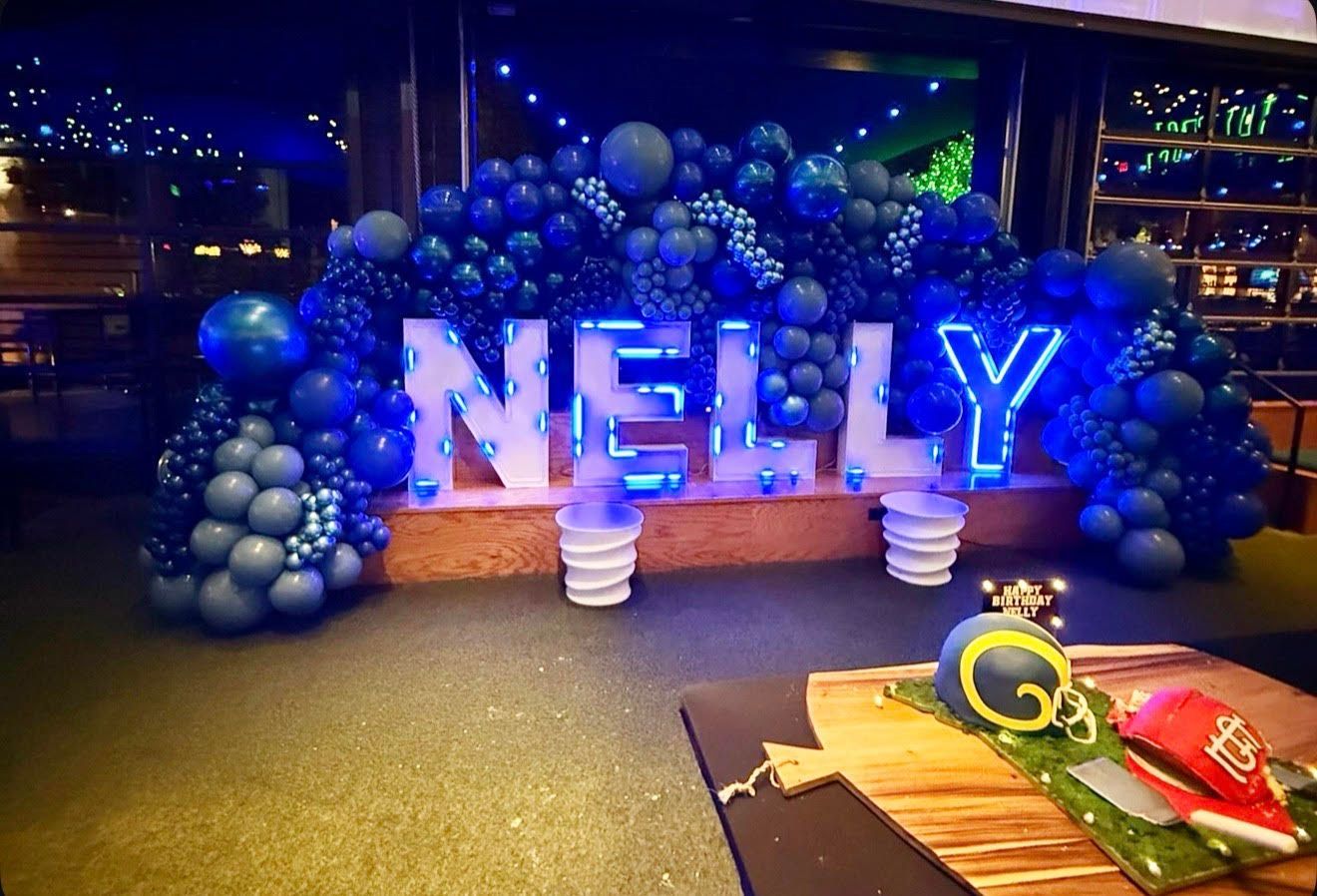 Blue balloon display spelling 