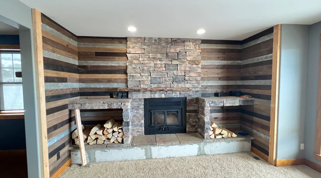 There is a fireplace in the middle of the room.