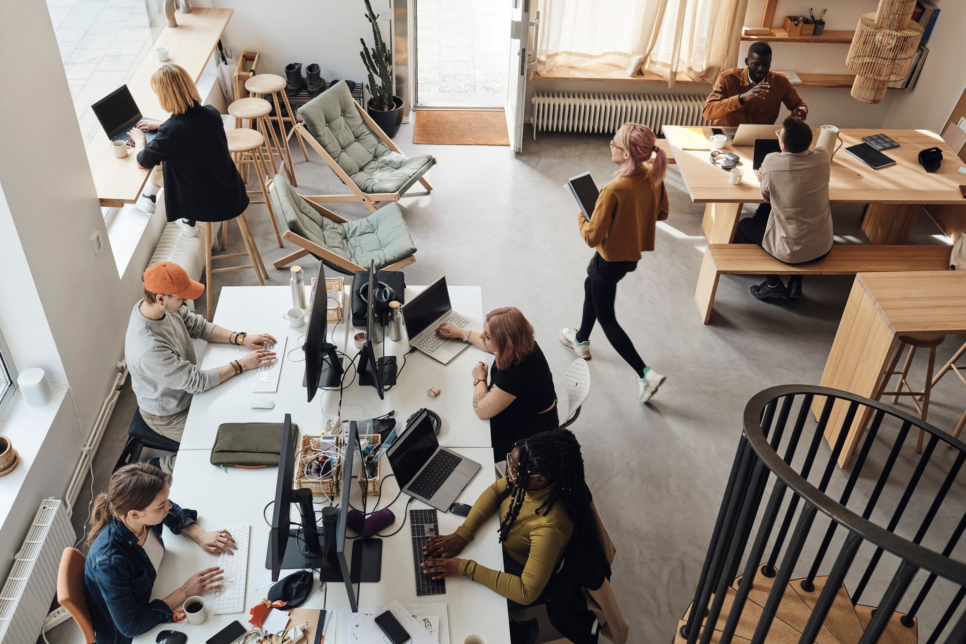 High angle view of male and female entrepreneurs working.