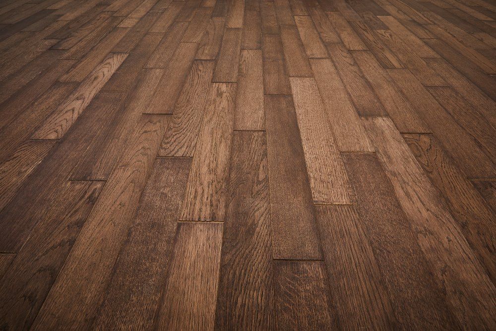 A Close Up of a Wooden Floor With a Diagonal Pattern — Freedom Flooring Pty Ltd in Gosford, NSW