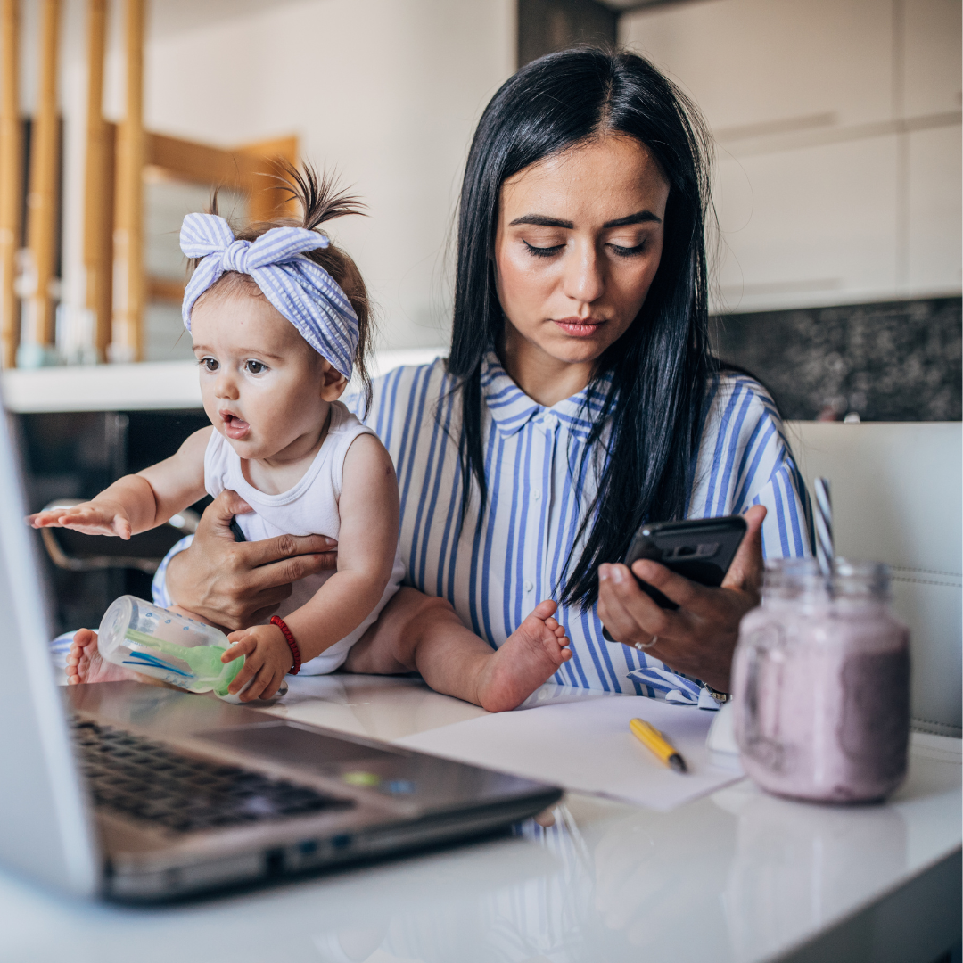 A young boy is crawling through a blue tunnel