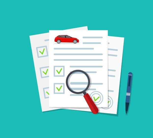 A magnifying glass is sitting on top of a piece of paper with a car on it.