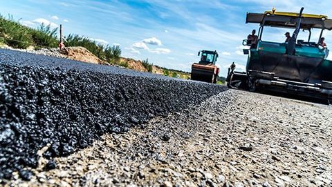 Road roller working on the construction site — Hudson, NC — Asphalt Roads