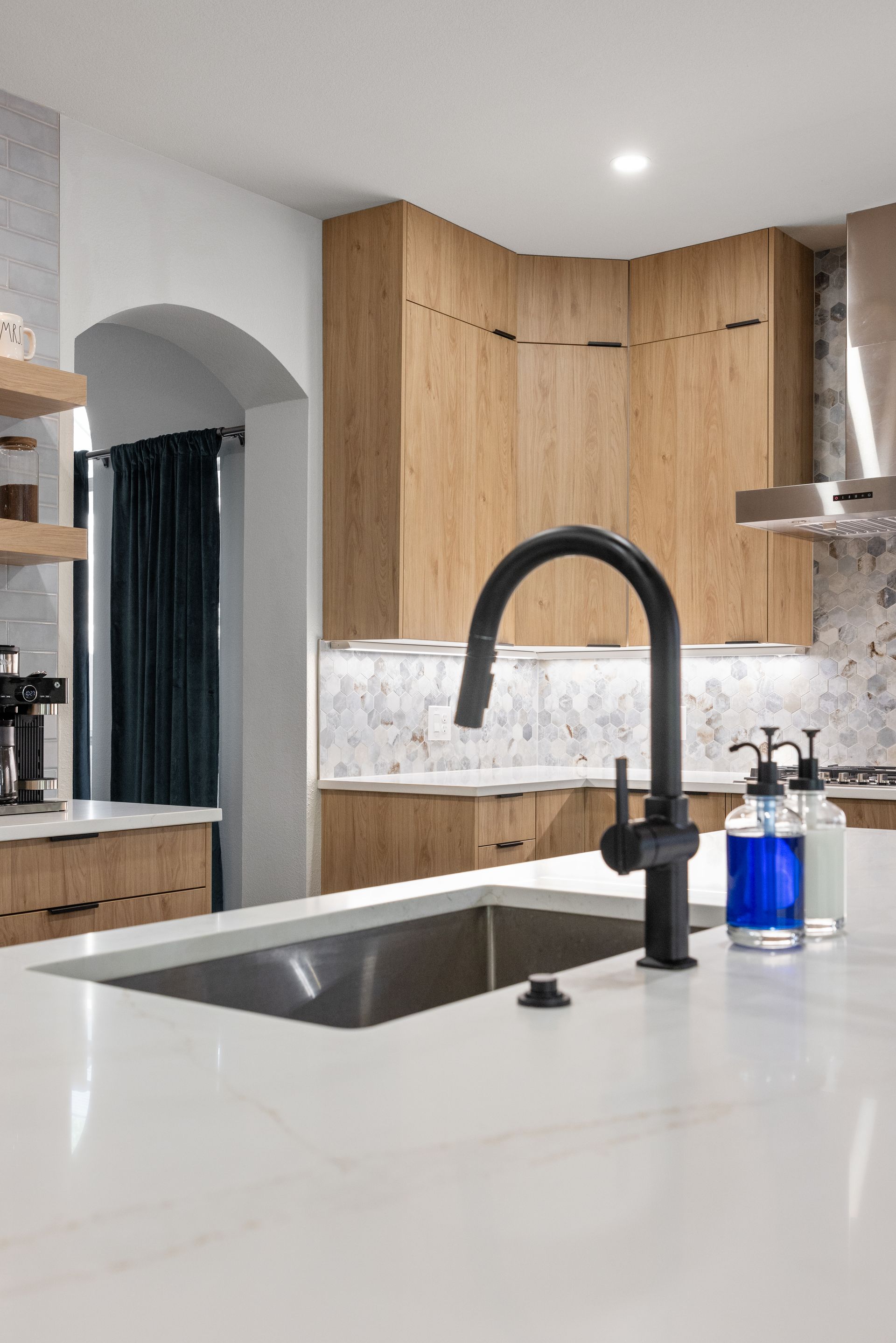 Black faucet and single basin sink