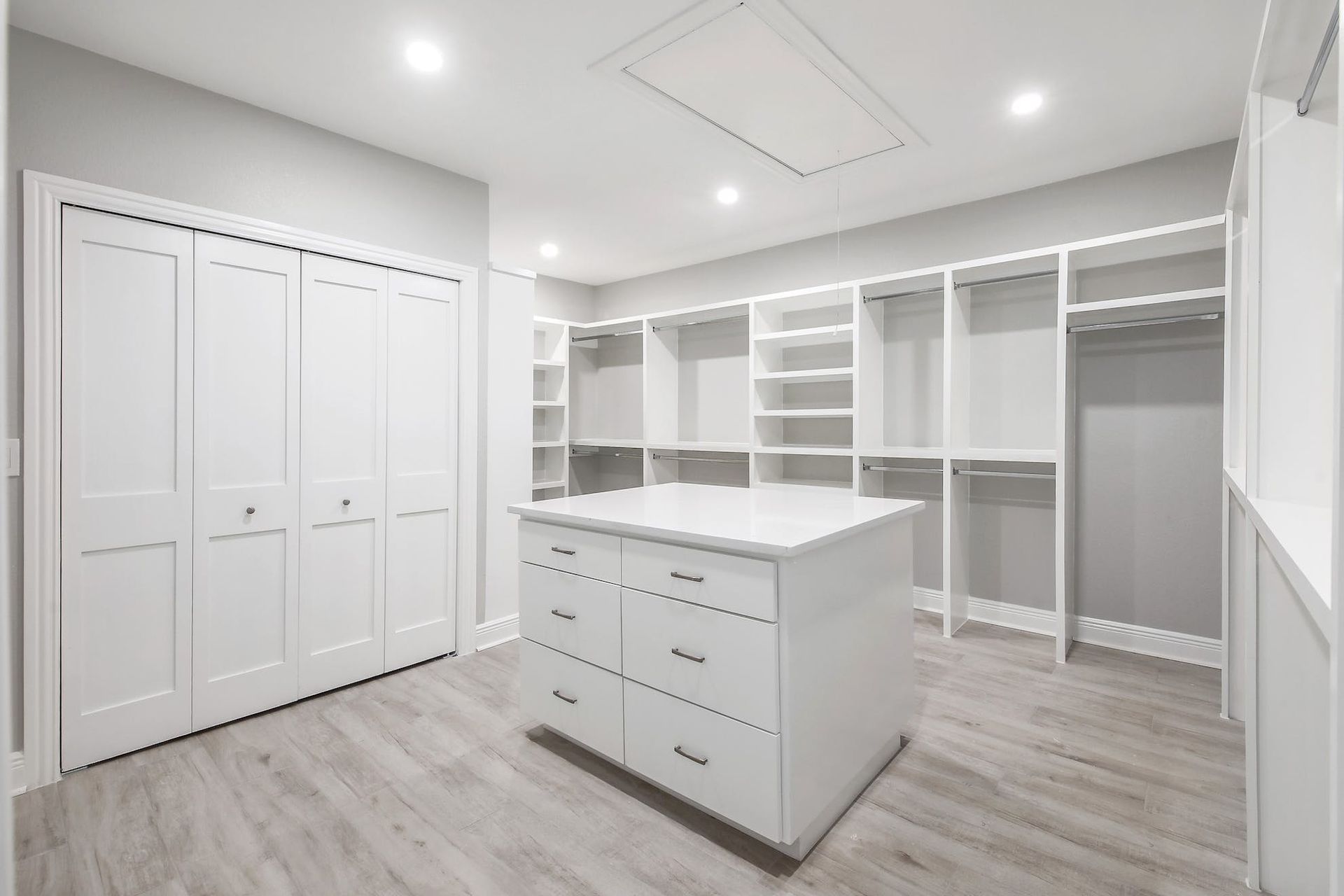 boutique closet with built in laundry area