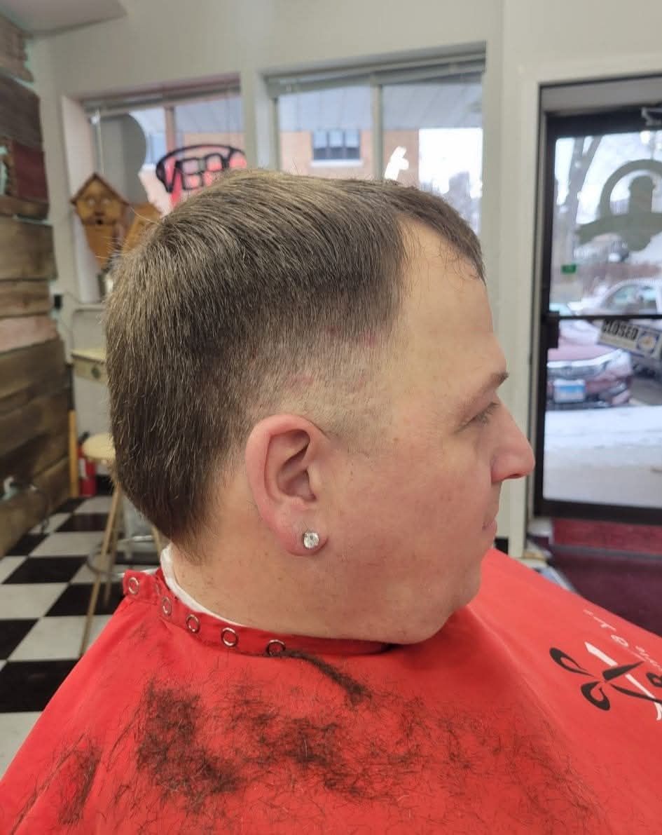 client with fresh haircut and beard trim