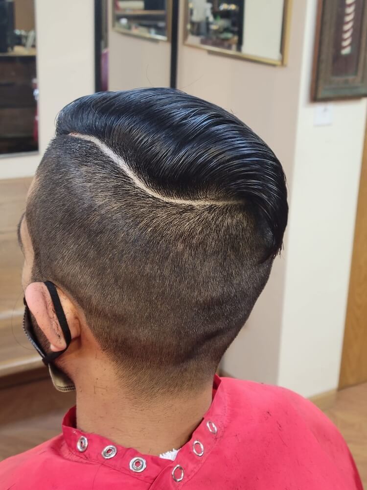 client with fresh, styled haircut