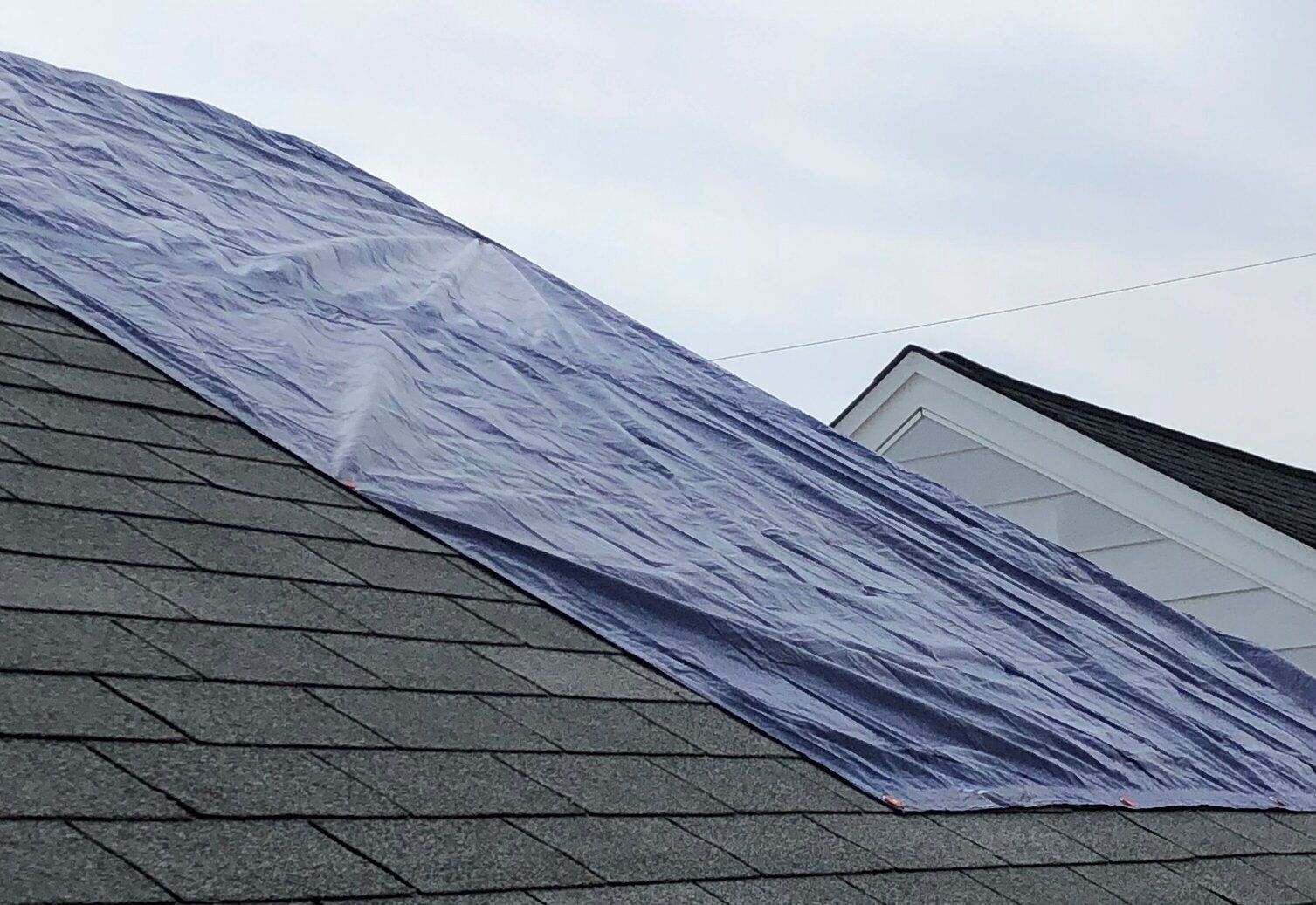 What should you do if you've experienced storm damage on your roof