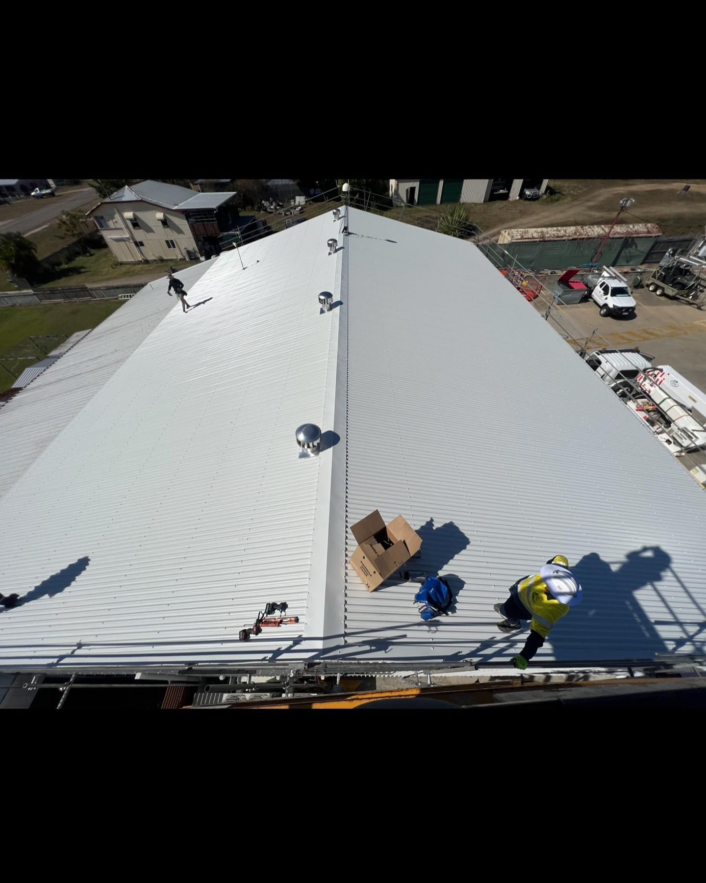 A Close Up of a Roof With a Lot of Insulation on It — CJM Plumbing & Roofing Mackay in Marian, QLD