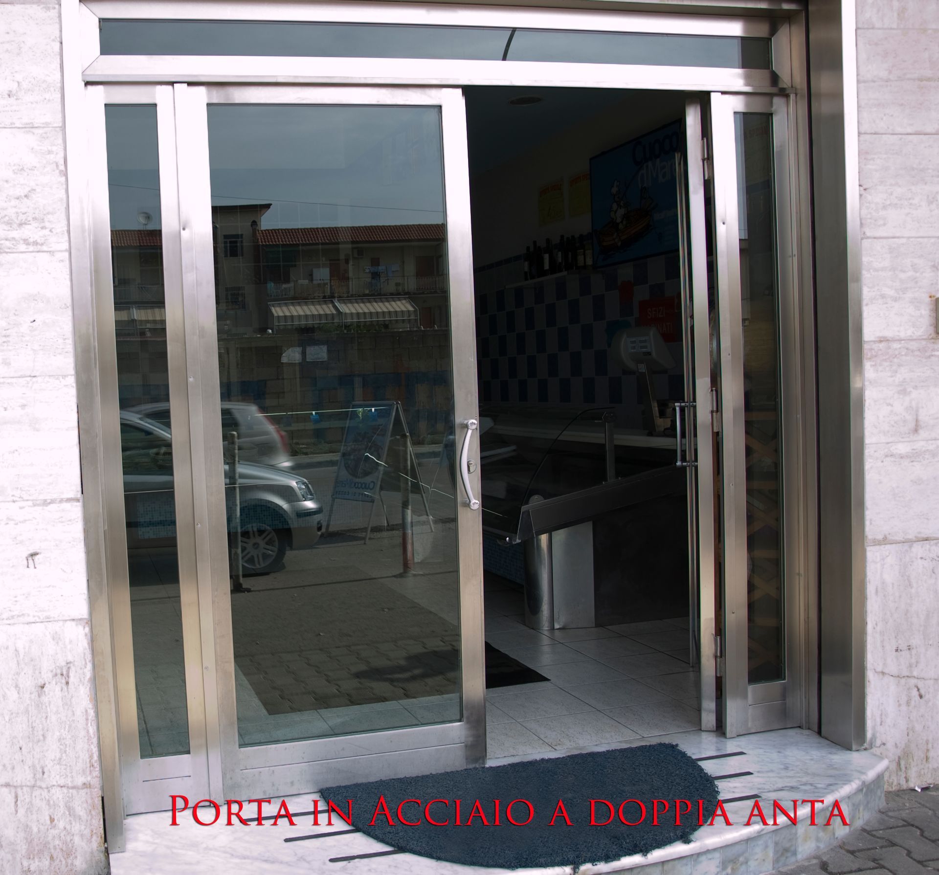 Porta in acciaio satinato doppia anta