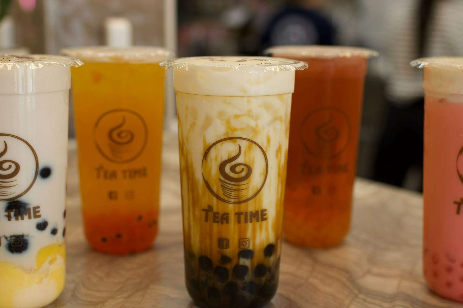 There are many different types of drinks on the table.