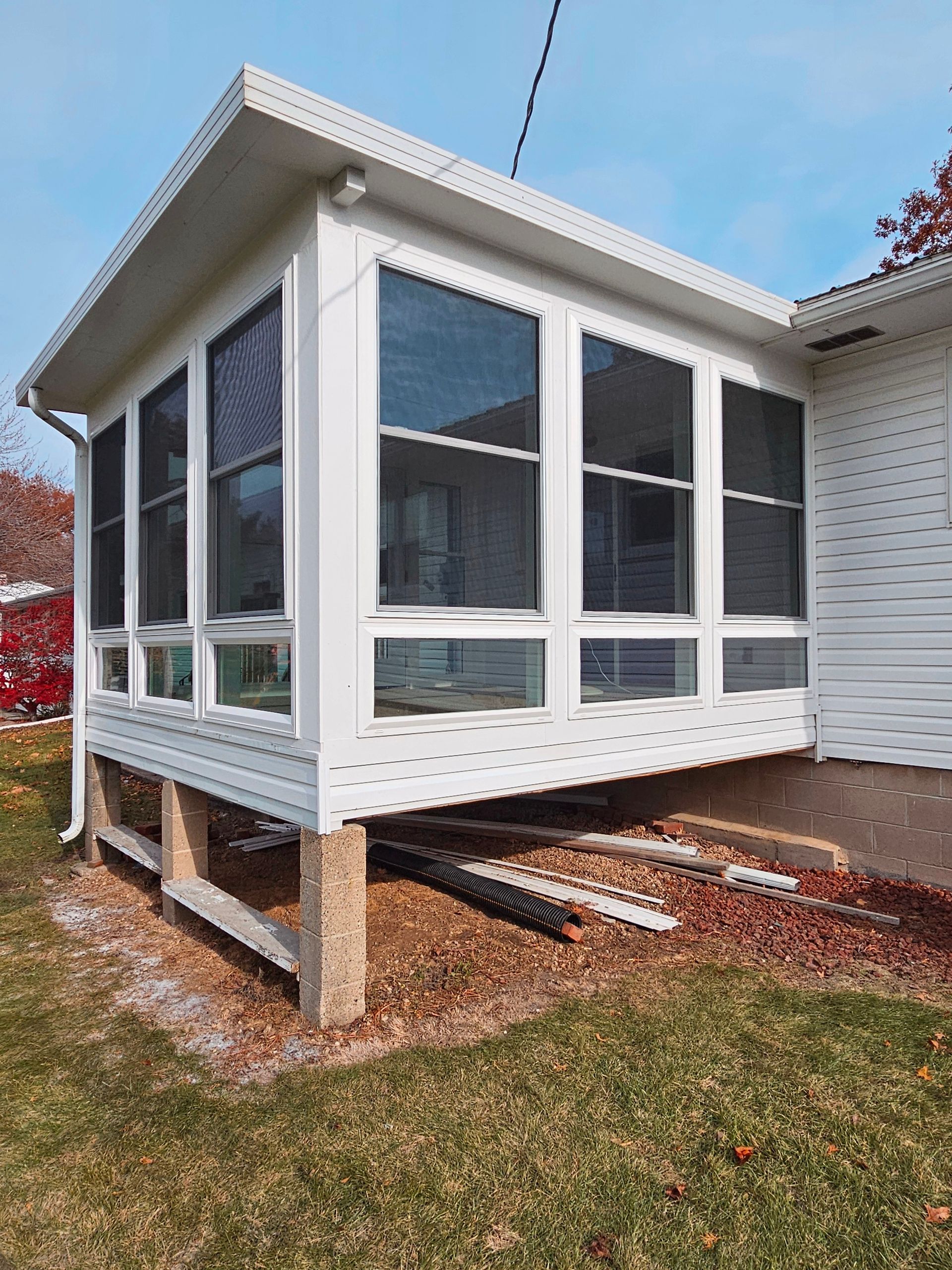 Finished 4-season room with full-view windows and a fully enclosed design for year-round comfort.
